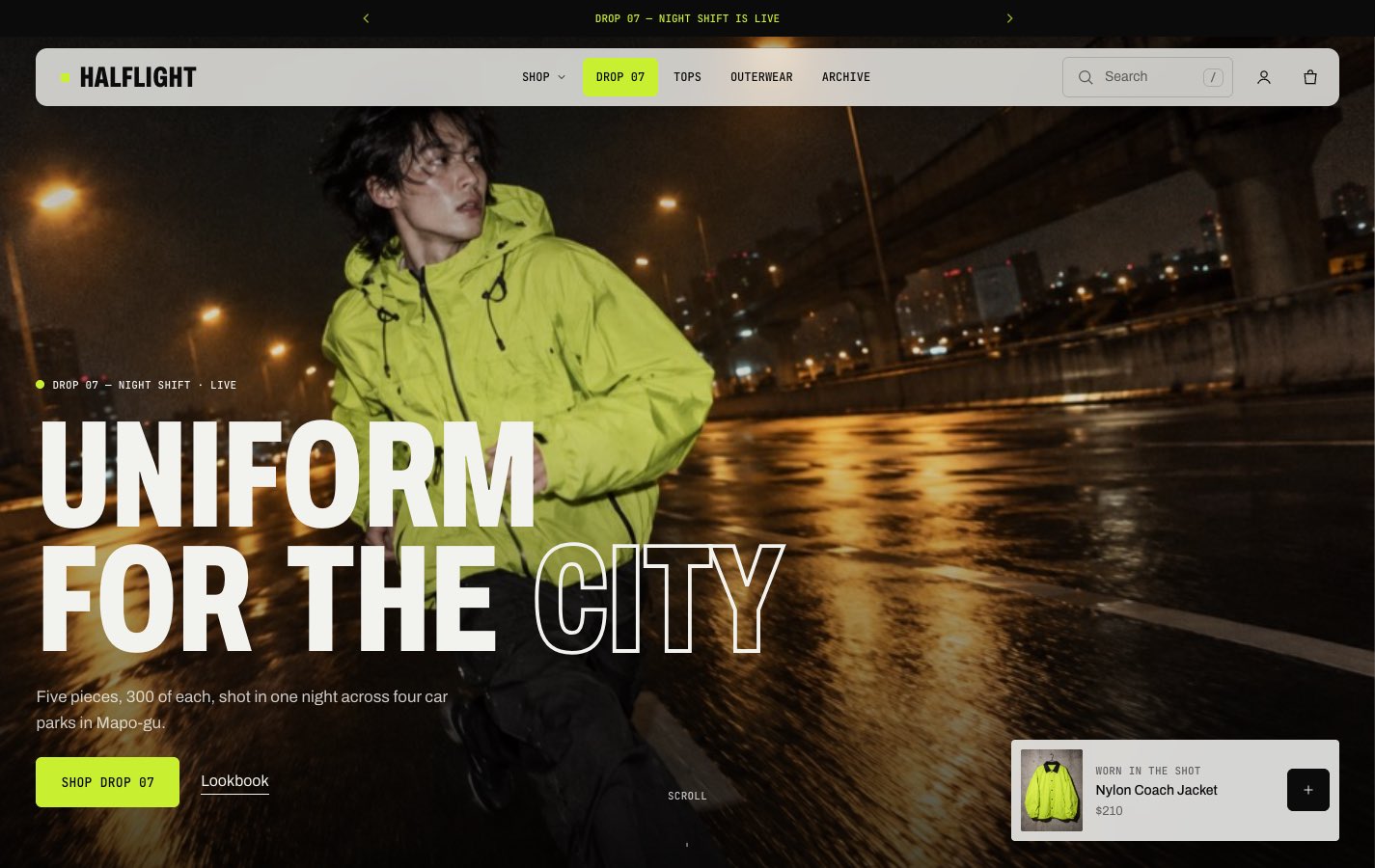 Graphite preset home page with the outlined headline Uniform for the city over a night street and a drop banner.