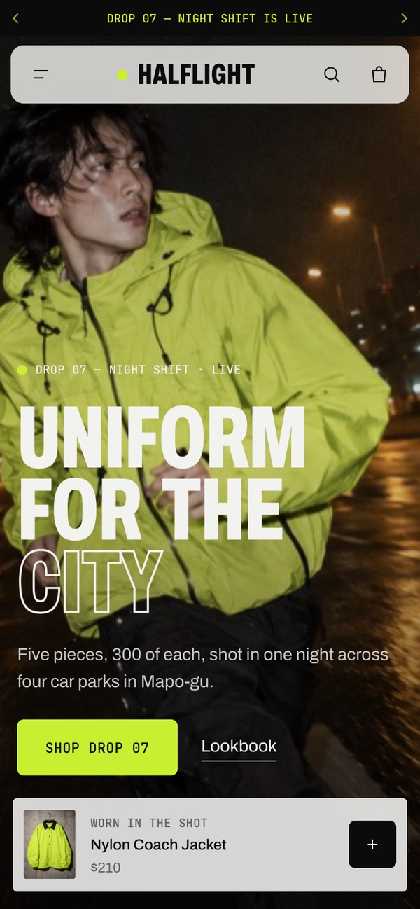 The Graphite preset home page on a phone, with the headline Uniform for the city in bold capitals over a night street.